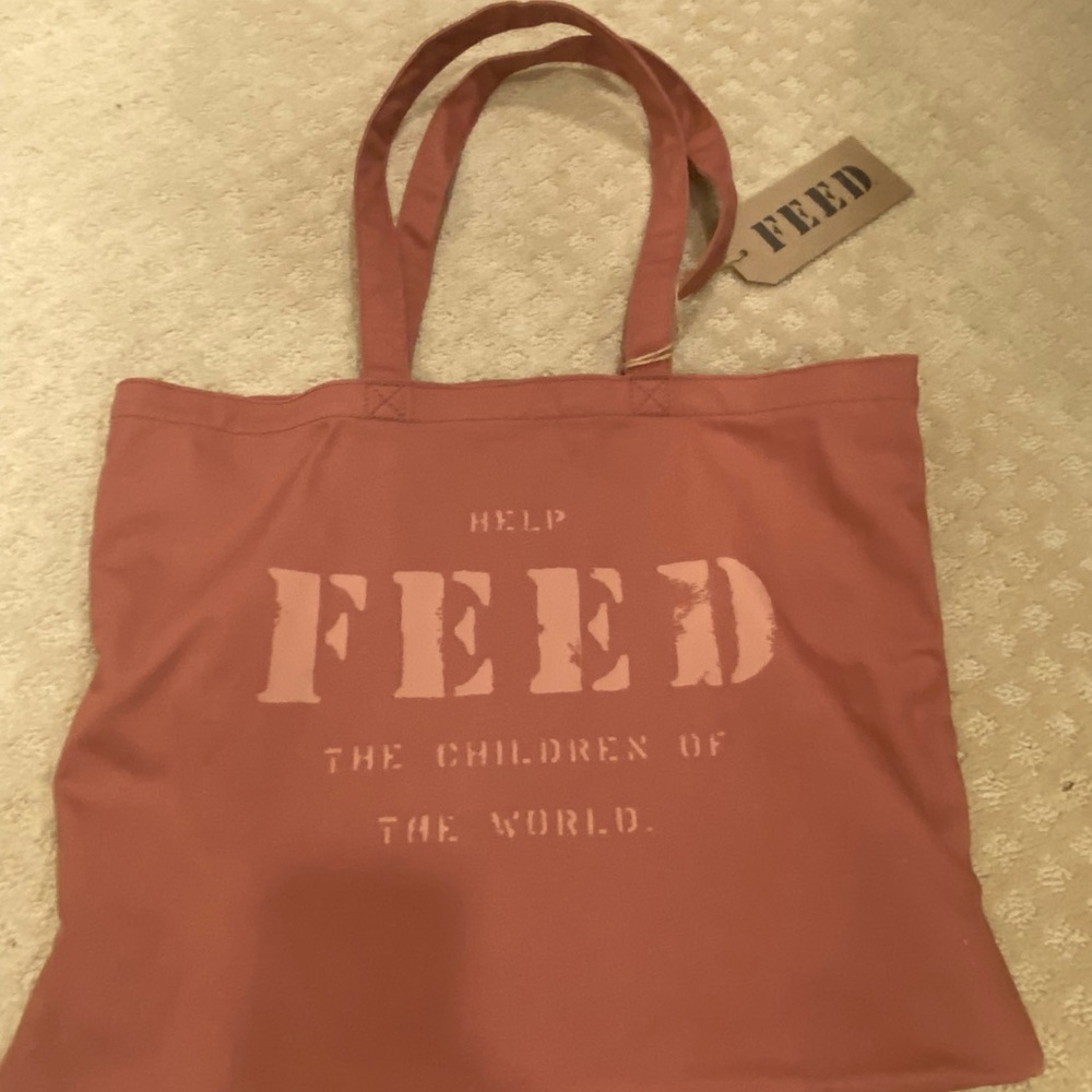 NWT “FEED” canvas shoulder bag